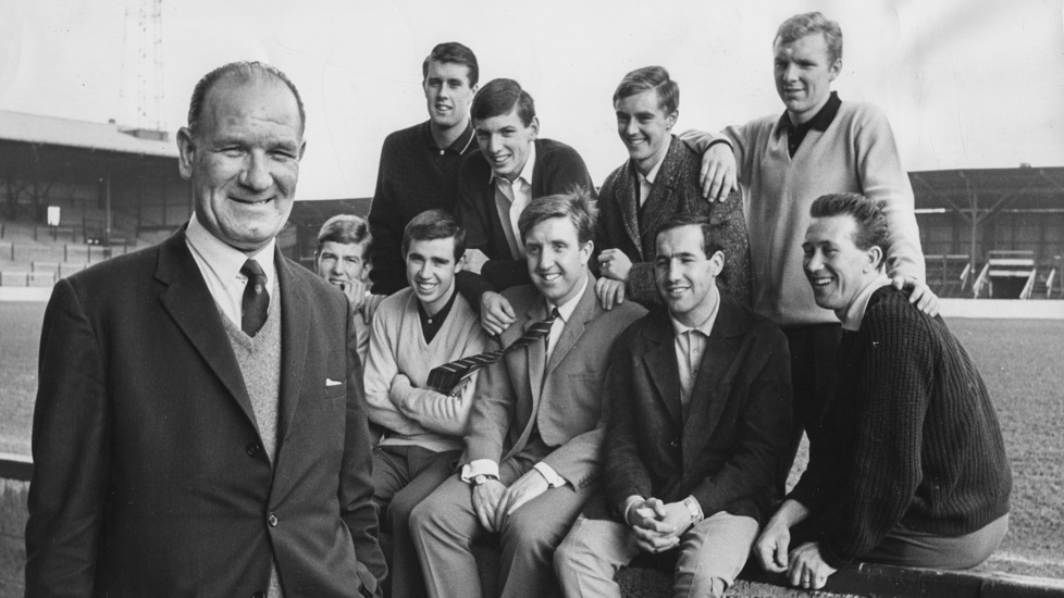 Football talent scout Wally St Pier (left) pictured with a group of West Ham United players whom he discovered early in their careers; (L-R) Geoff Hurst, Martin Peters, John Sissons, Bobby Moore, Jack Burkett, Ronnie Boyce, John Bond, Eddie Bovington and Ken Brown, prior to the teams FA Cup match against Burnley FC, at Upton Park, London, February 28th 1964. (Photo by Keystone/Hulton Archive/Getty Images)